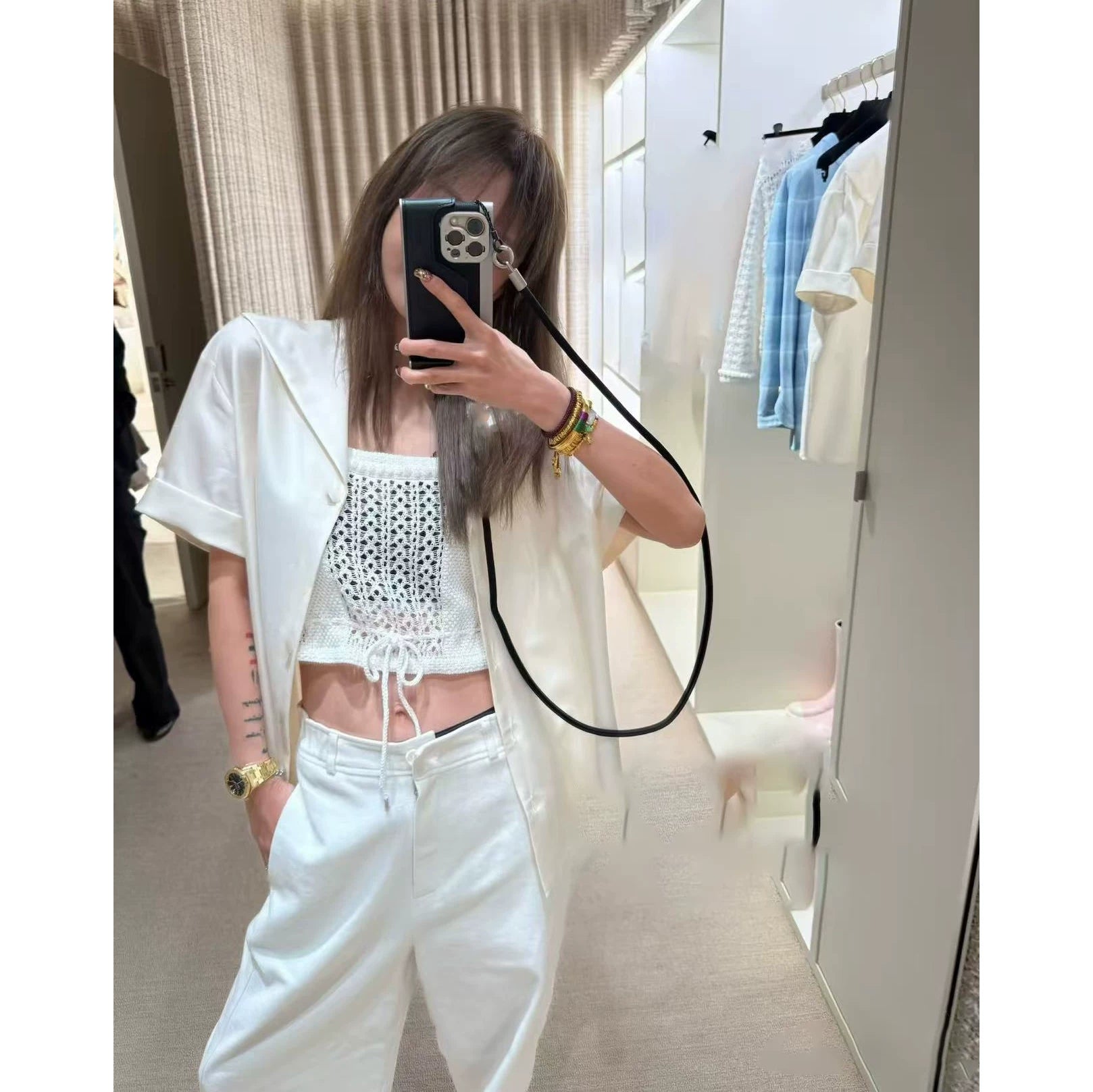 2026 early spring design sense high temperament white crochet woven hollow drawstring sleeveless sling vest top women