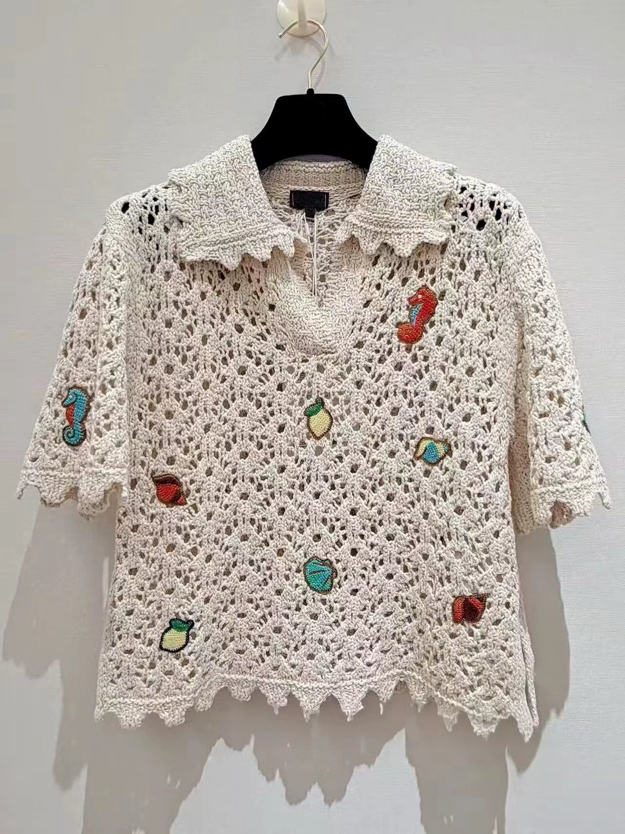 Spring and summer 26ss June, Nanyou haute couture 26M summer new holiday wind ocean embroidery lapel hollow knitted sweater elastic waist A word skirt