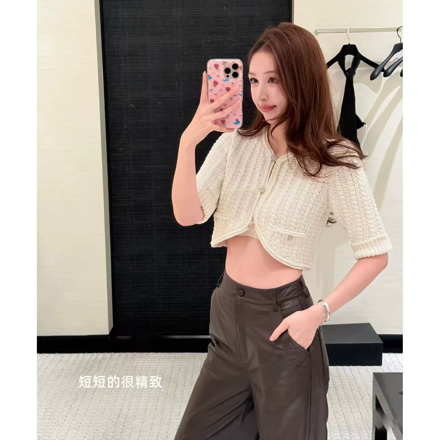 2025 autumn and winter design sense senior heavy industry hollowed out age-reducing twist knitted cardigan short small long-sleeved top