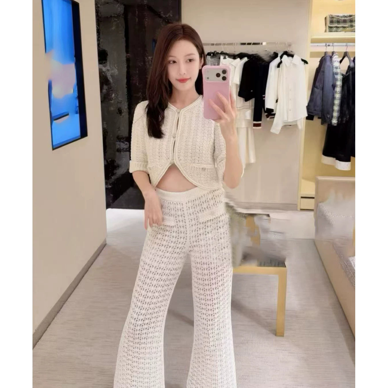 2025 autumn and winter design sense senior heavy industry hollowed out age-reducing twist knitted cardigan short small long-sleeved top