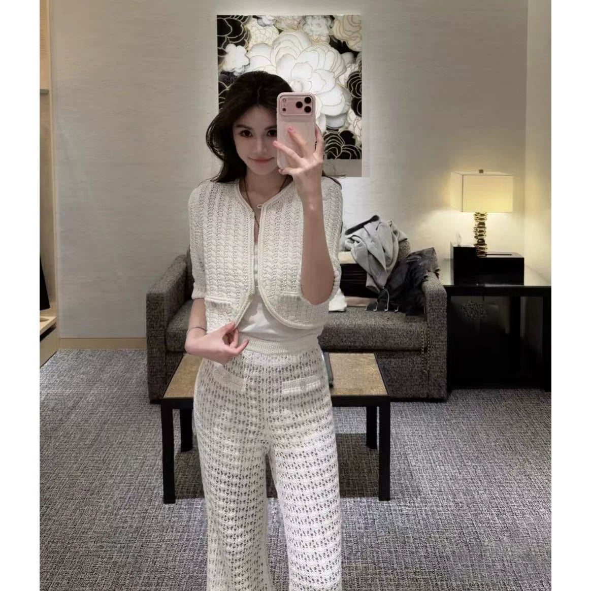2025 autumn and winter design sense senior heavy industry hollowed out age-reducing twist knitted cardigan short small long-sleeved top