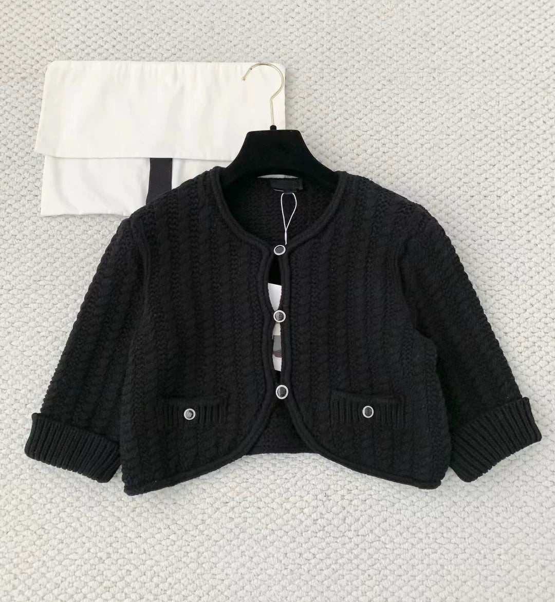 2025 autumn and winter design sense senior heavy industry hollowed out age-reducing twist knitted cardigan short small long-sleeved top