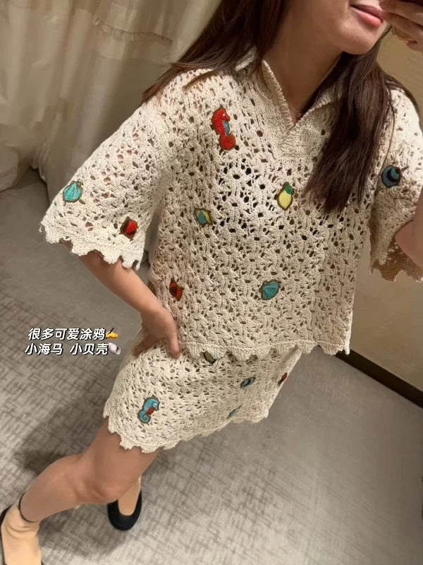 Spring and summer 26ss June, Nanyou haute couture 26M summer new holiday wind ocean embroidery lapel hollow knitted sweater elastic waist A word skirt