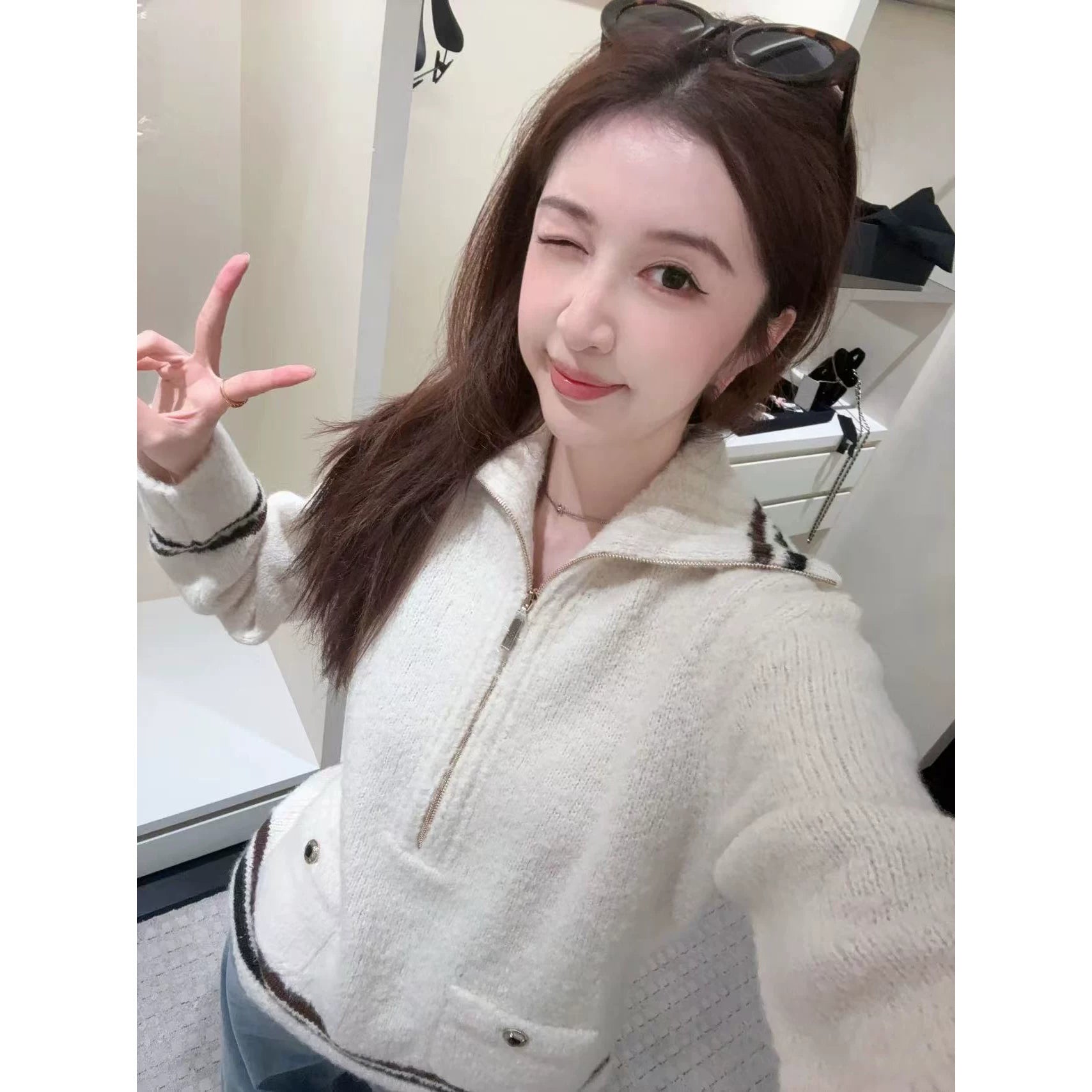 2025 autumn and winter foreign style ski bow v-neck half zipper knitted long-sleeved cardigan + high waist skirt women's suit