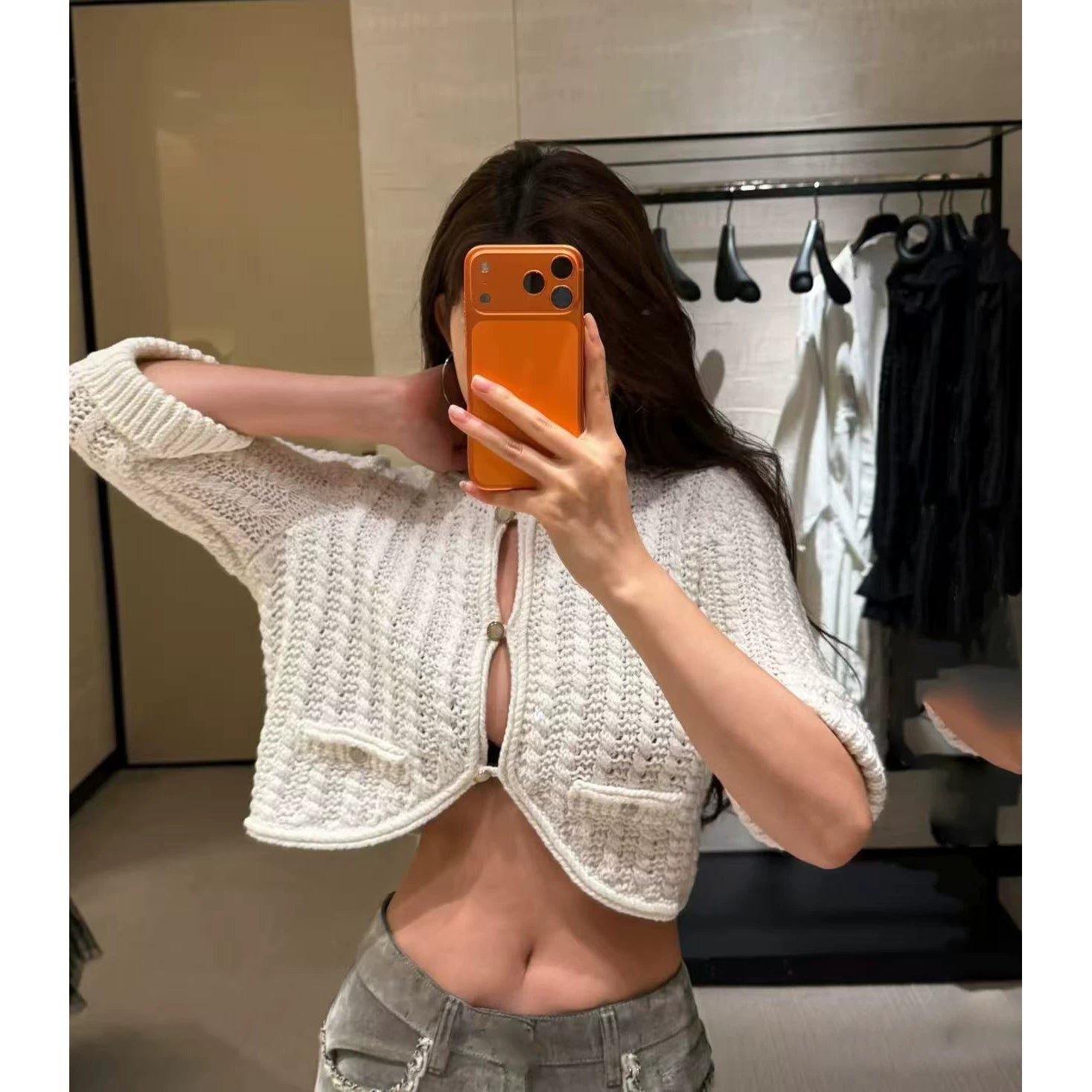2025 autumn and winter design sense senior heavy industry hollowed out age-reducing twist knitted cardigan short small long-sleeved top