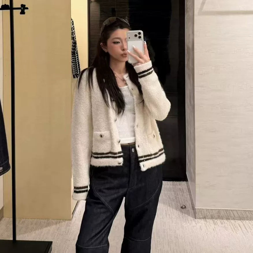 2025 autumn and winter foreign style fashionable skiing bow girlish knitted short-sleeved cardigan + high waist skirt women's suit