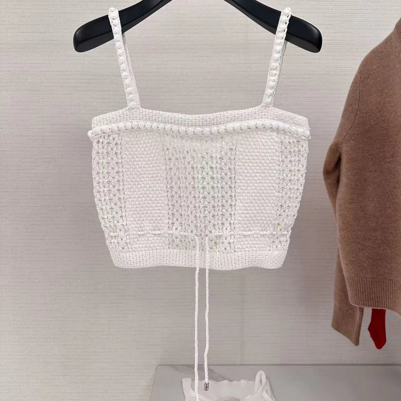 2026 early spring design sense high temperament white crochet woven hollow drawstring sleeveless sling vest top women