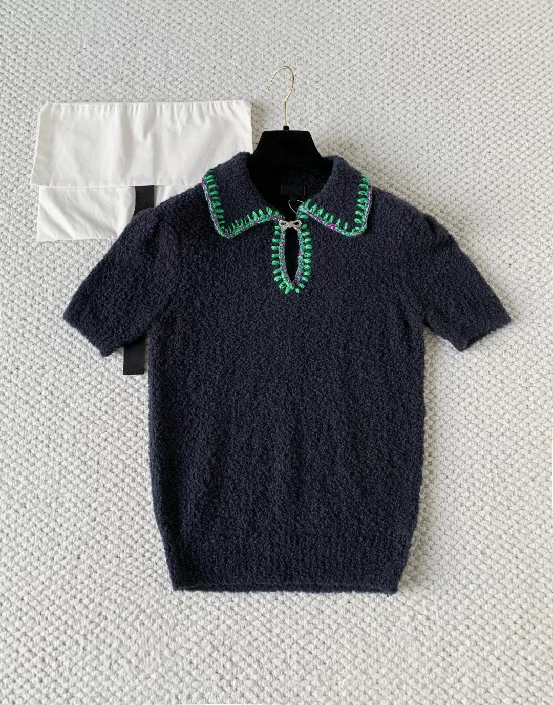 2025 autumn and winter foreign style fashionable skiing bow girlish knitted short-sleeved cardigan + high waist skirt women's suit